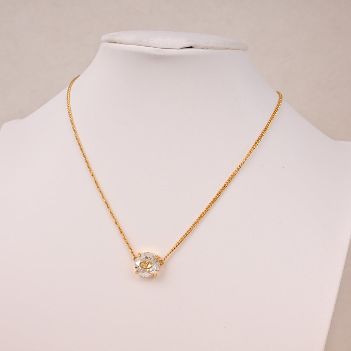 Martin Graham pendant necklace in polished metal-tone