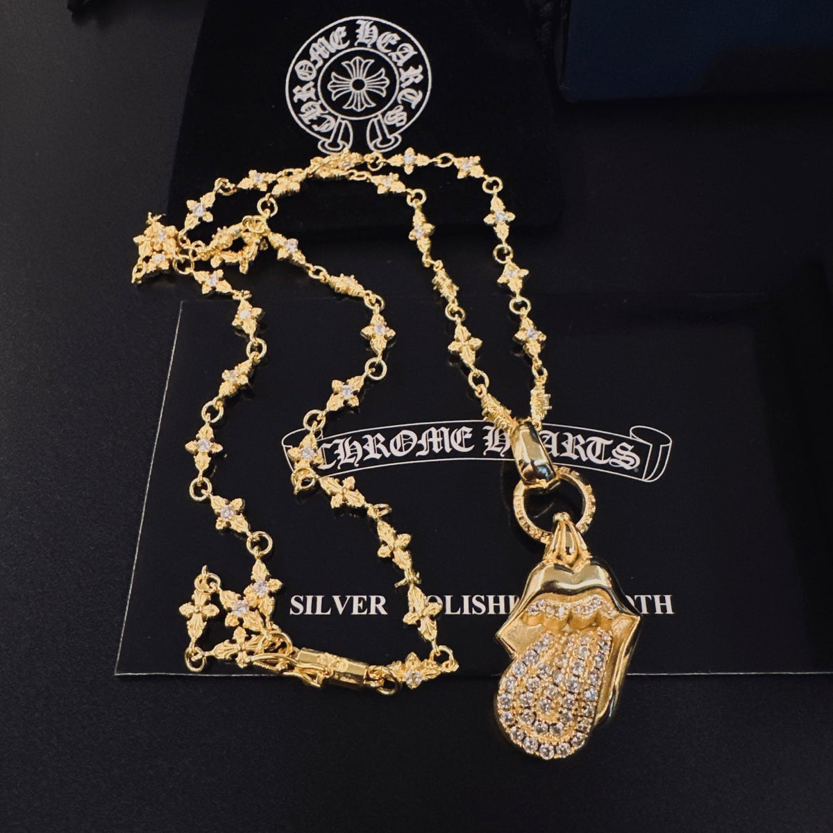 Martin Graham pendant necklace in polished metal-tone – close-up detail