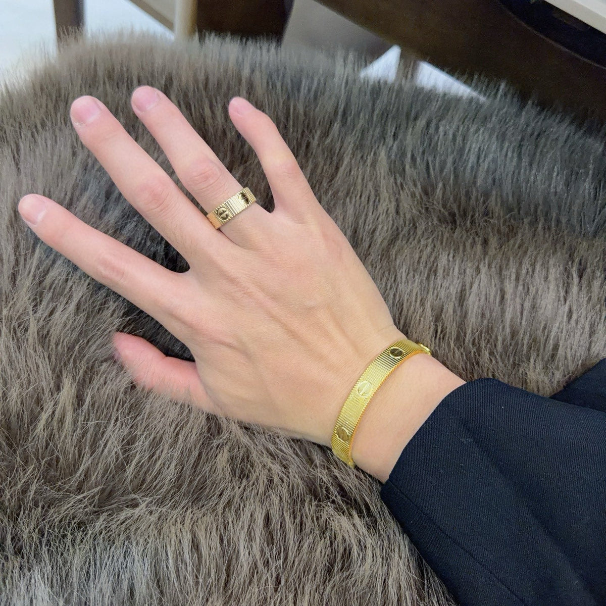 Martin Graham ring in polished metal-tone