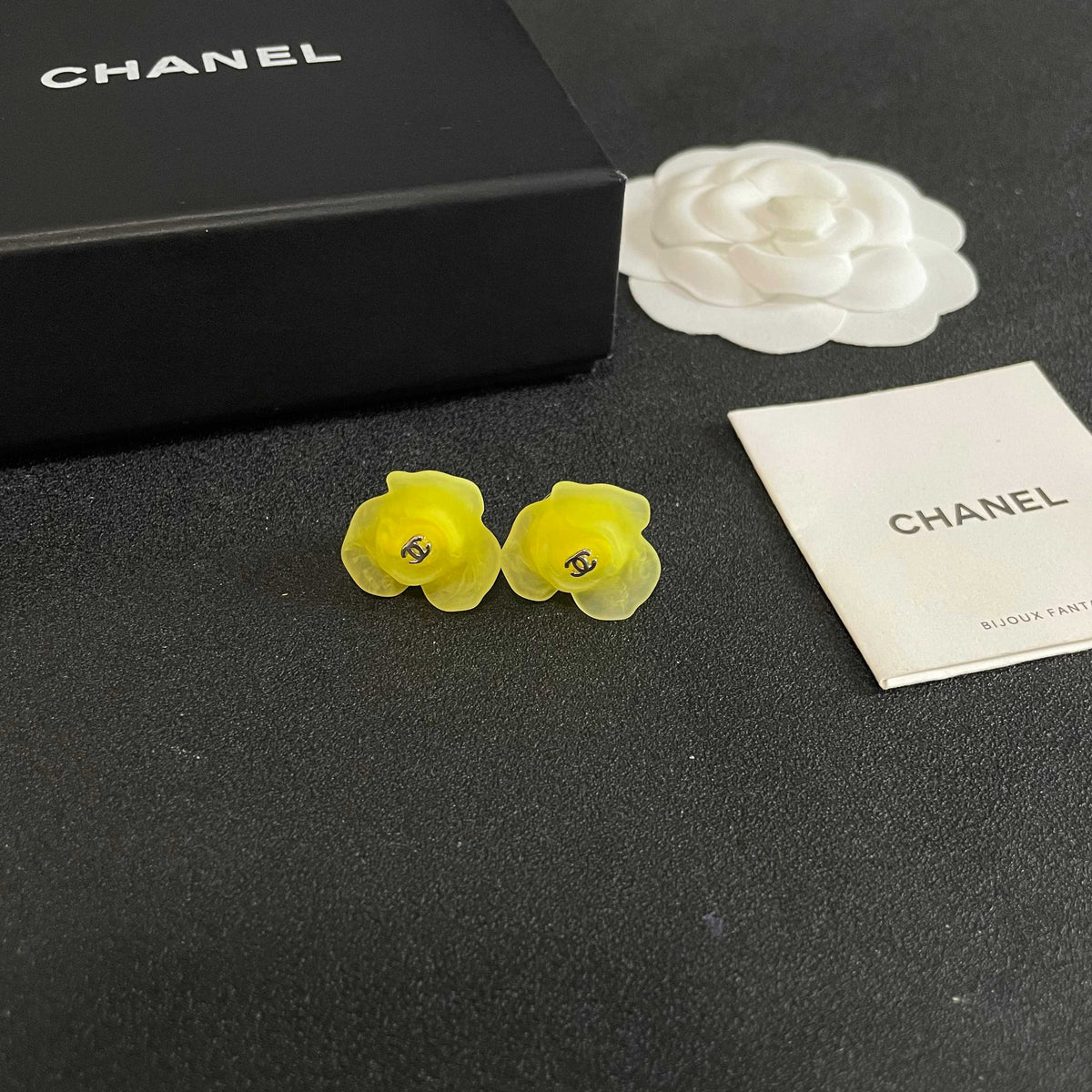 Martin Graham stud earrings in polished metal-tone – styled product view