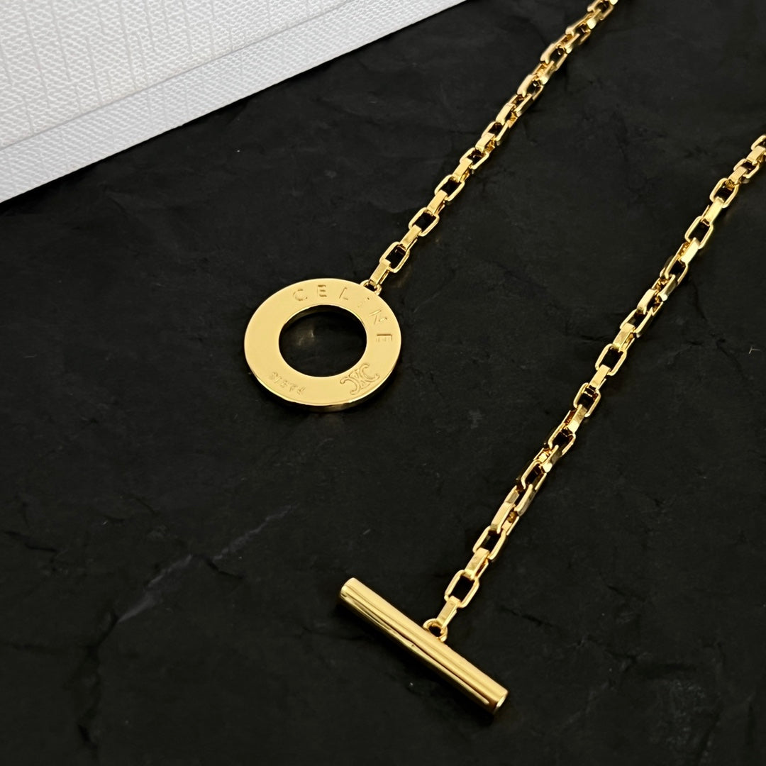 Martin Graham pendant necklace in polished metal-tone