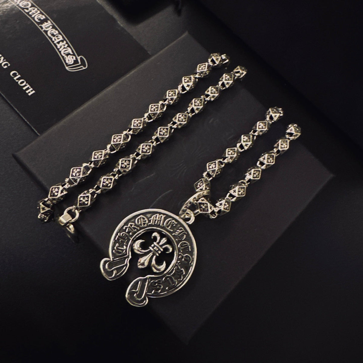 Martin Graham pendant necklace in polished metal-tone – styled product view