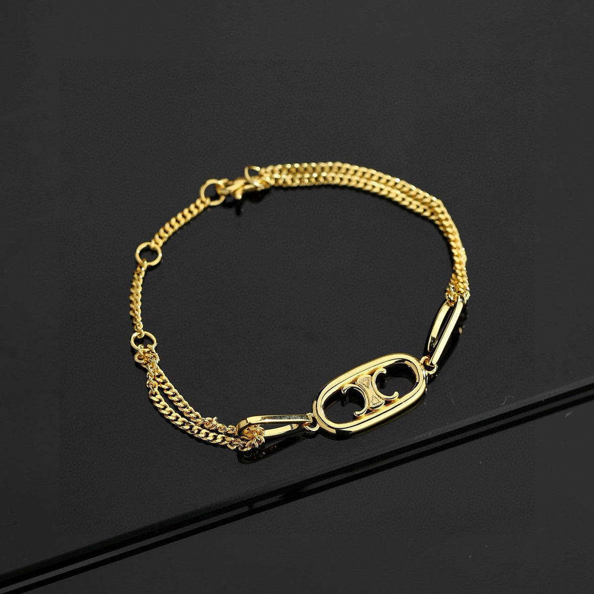 Martin Graham jewelry accessory in polished metal-tone