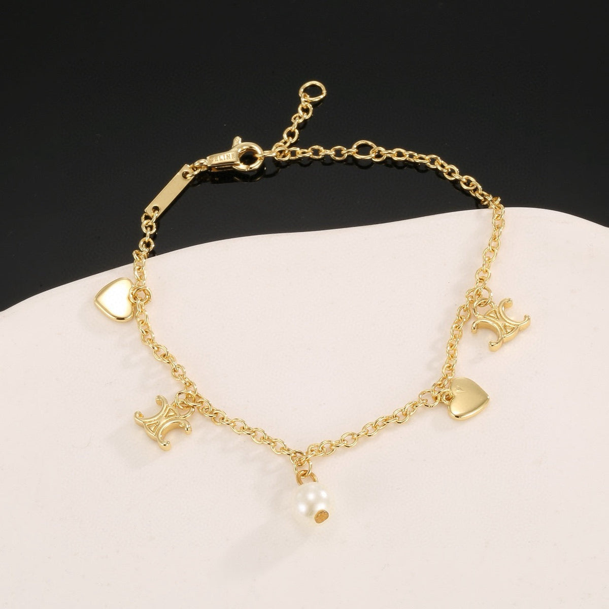 Martin Graham bracelet in polished metal-tone