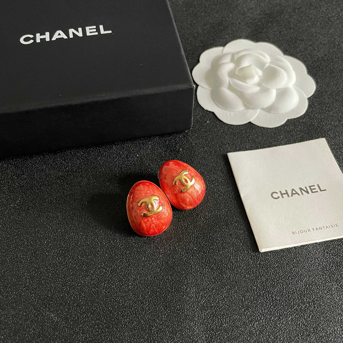 Martin Graham stud earrings in polished metal-tone – styled product view
