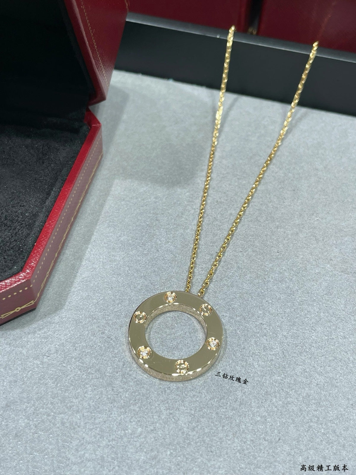 Martin Graham pendant necklace in polished metal-tone – close-up detail