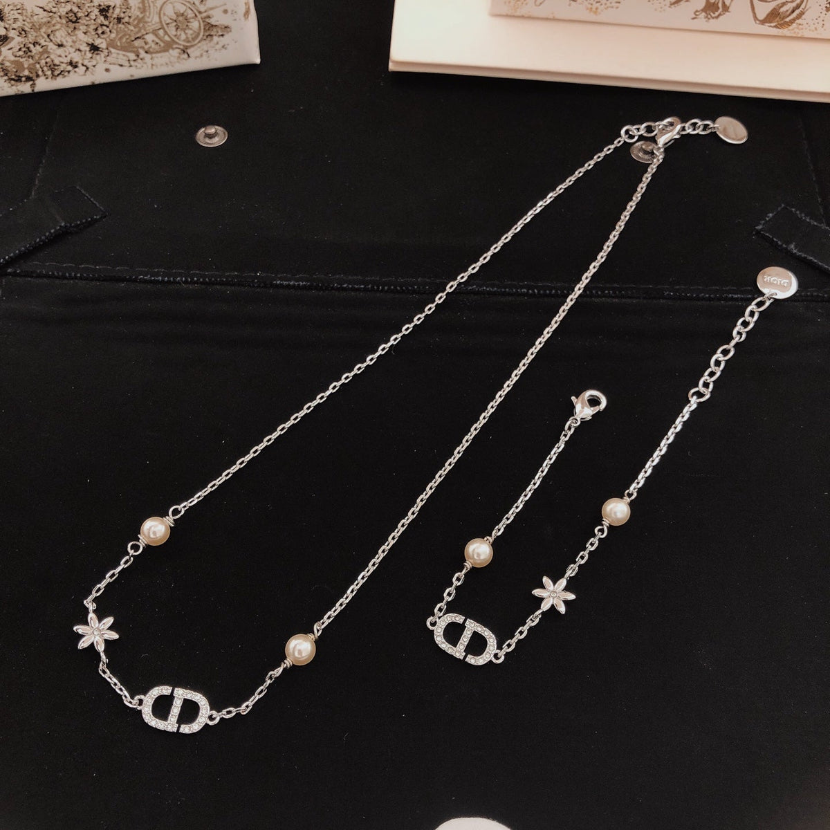 Martin Graham pendant necklace in polished metal-tone – close-up detail