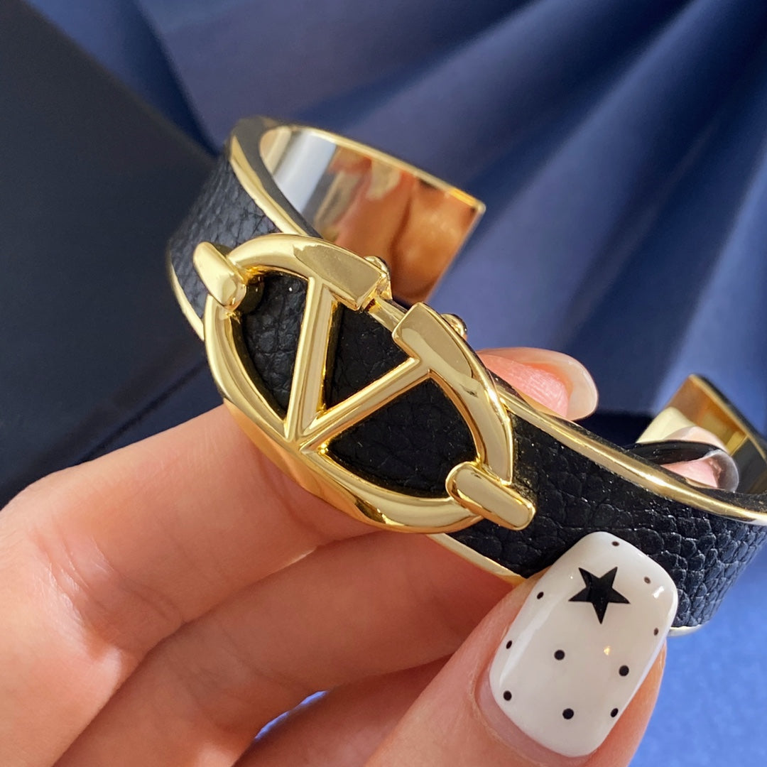 Martin Graham cuff bracelet in polished metal-tone