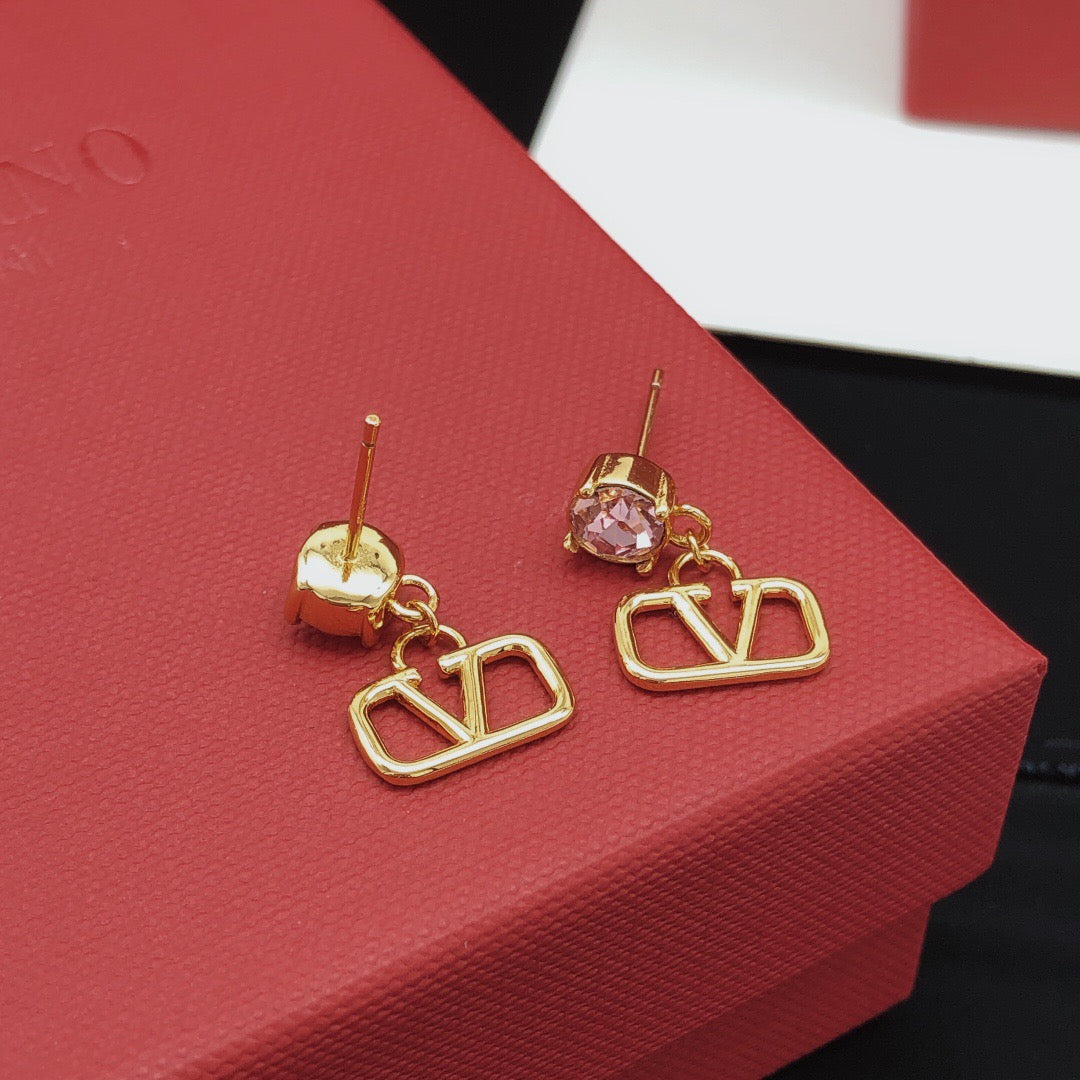 Martin Graham stud earrings in polished metal-tone