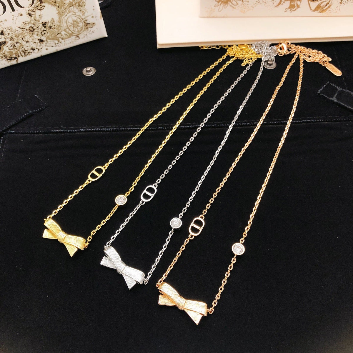 Martin Graham pendant necklace in polished metal-tone – close-up detail