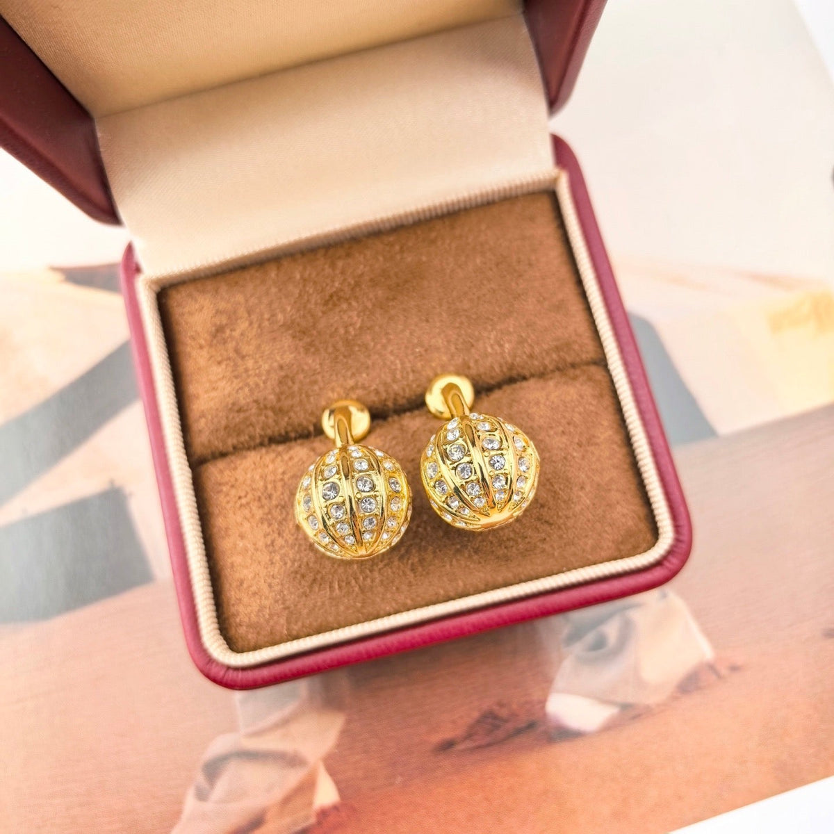 Martin Graham earrings in polished metal-tone