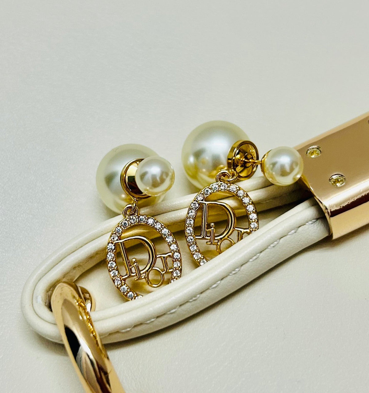 Martin Graham earrings in polished metal-tone – close-up detail