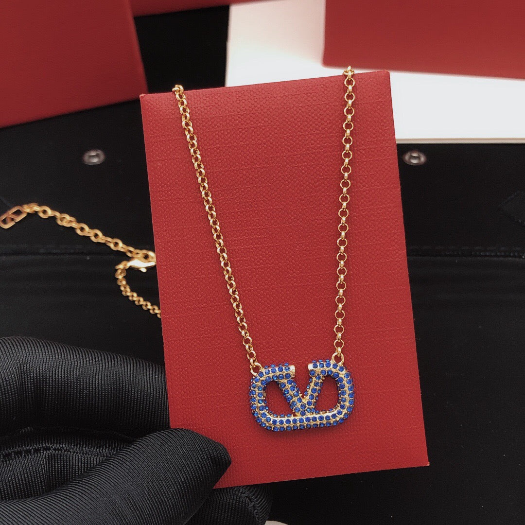 Martin Graham pendant necklace in polished metal-tone