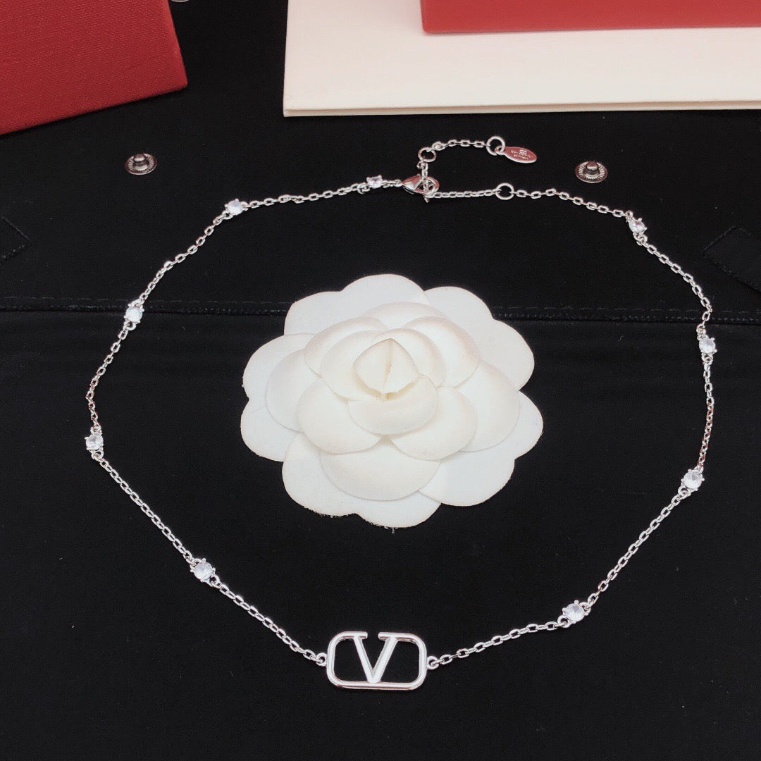 Martin Graham pendant necklace in polished metal-tone