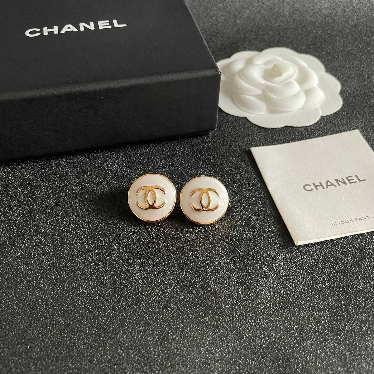 Martin Graham stud earrings in polished metal-tone – styled product view