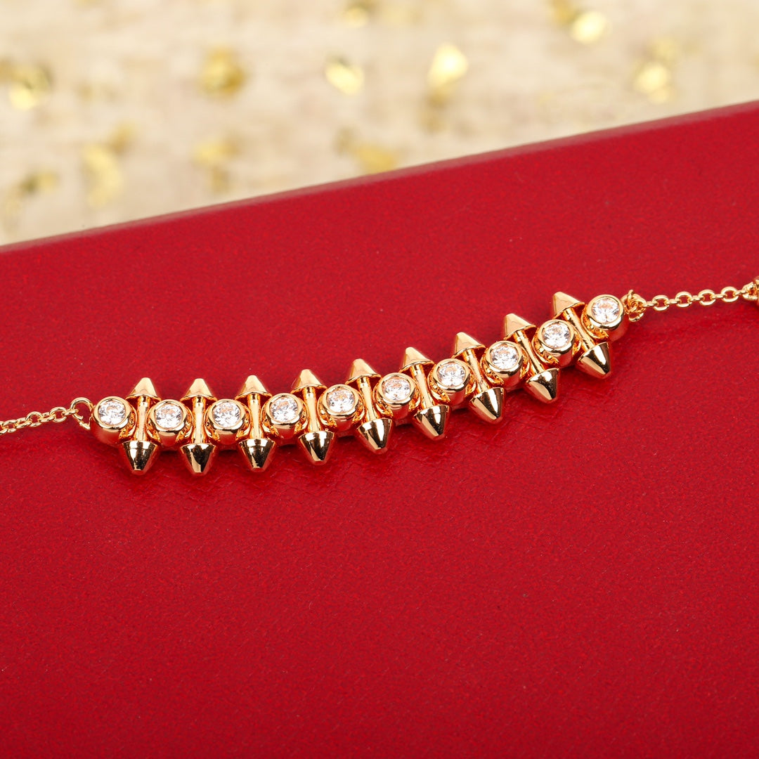 Martin Graham pendant necklace in polished metal-tone – close-up detail