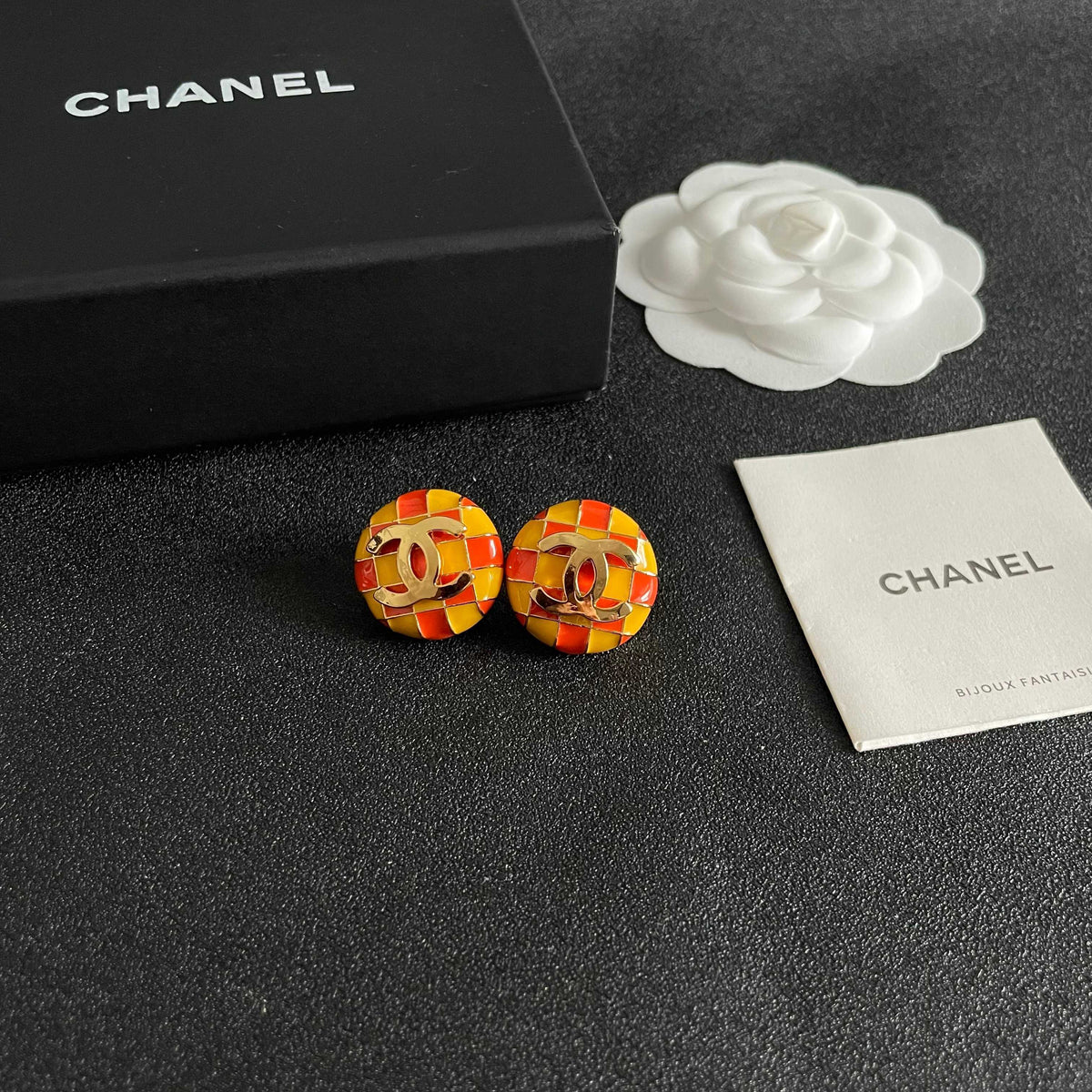 Martin Graham stud earrings in polished metal-tone – styled product view