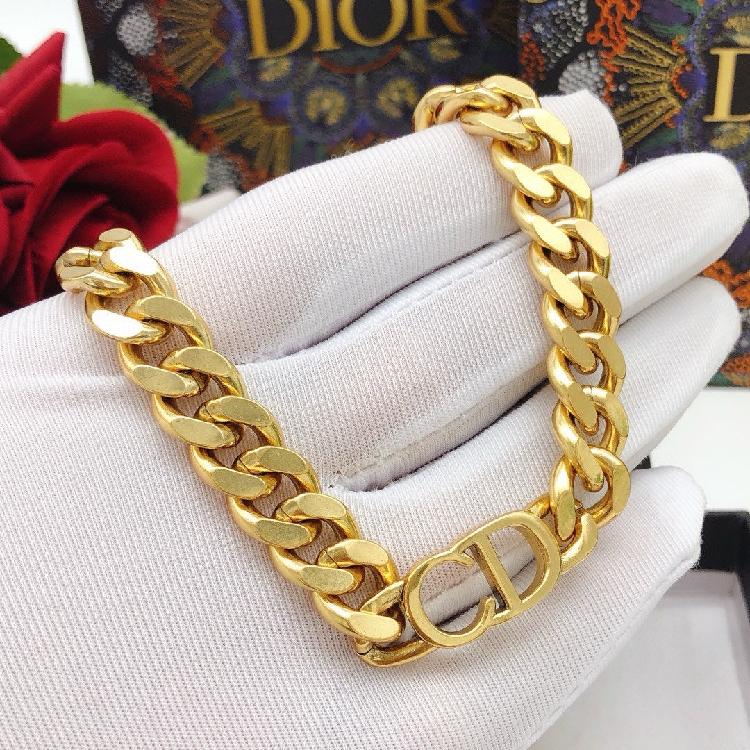 Martin Graham jewelry accessory in polished metal-tone – close-up detail