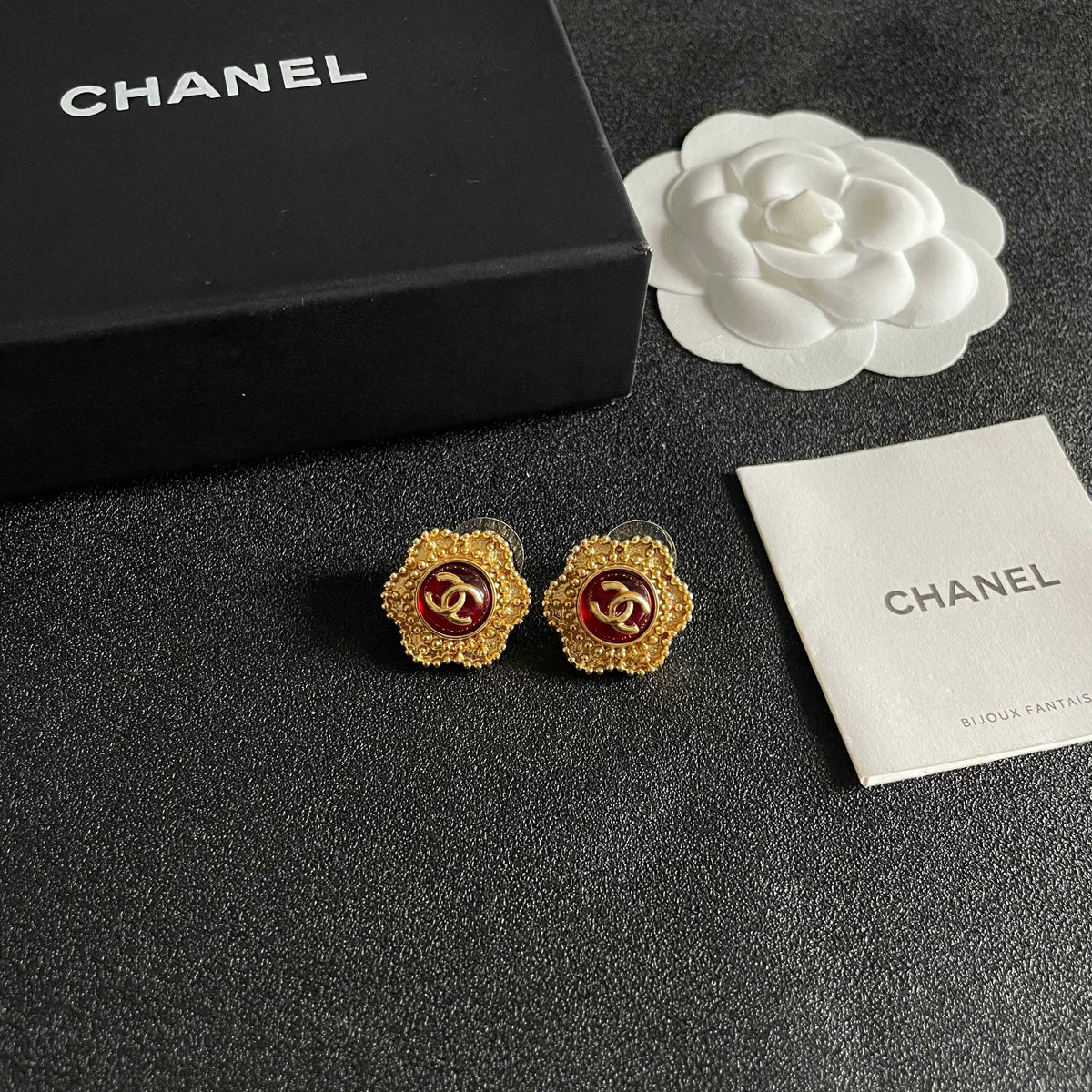 Martin Graham stud earrings in polished metal-tone – styled product view