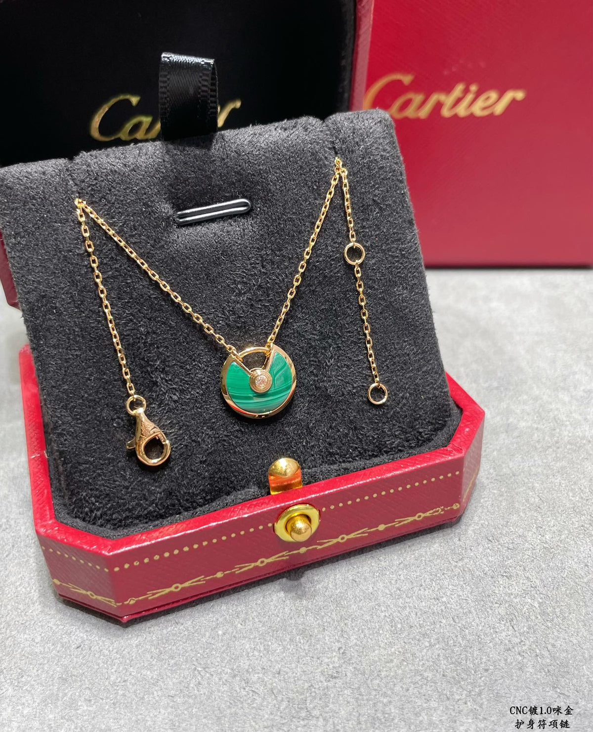 Martin Graham pendant necklace in polished metal-tone – close-up detail