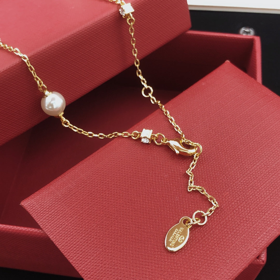 Martin Graham pendant necklace in polished metal-tone