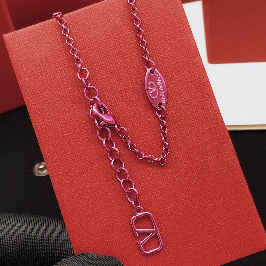 Martin Graham pendant necklace in polished metal-tone