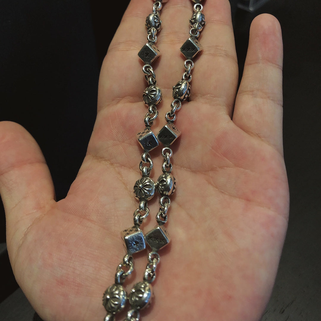 Martin Graham pendant necklace in polished metal-tone – styled product view