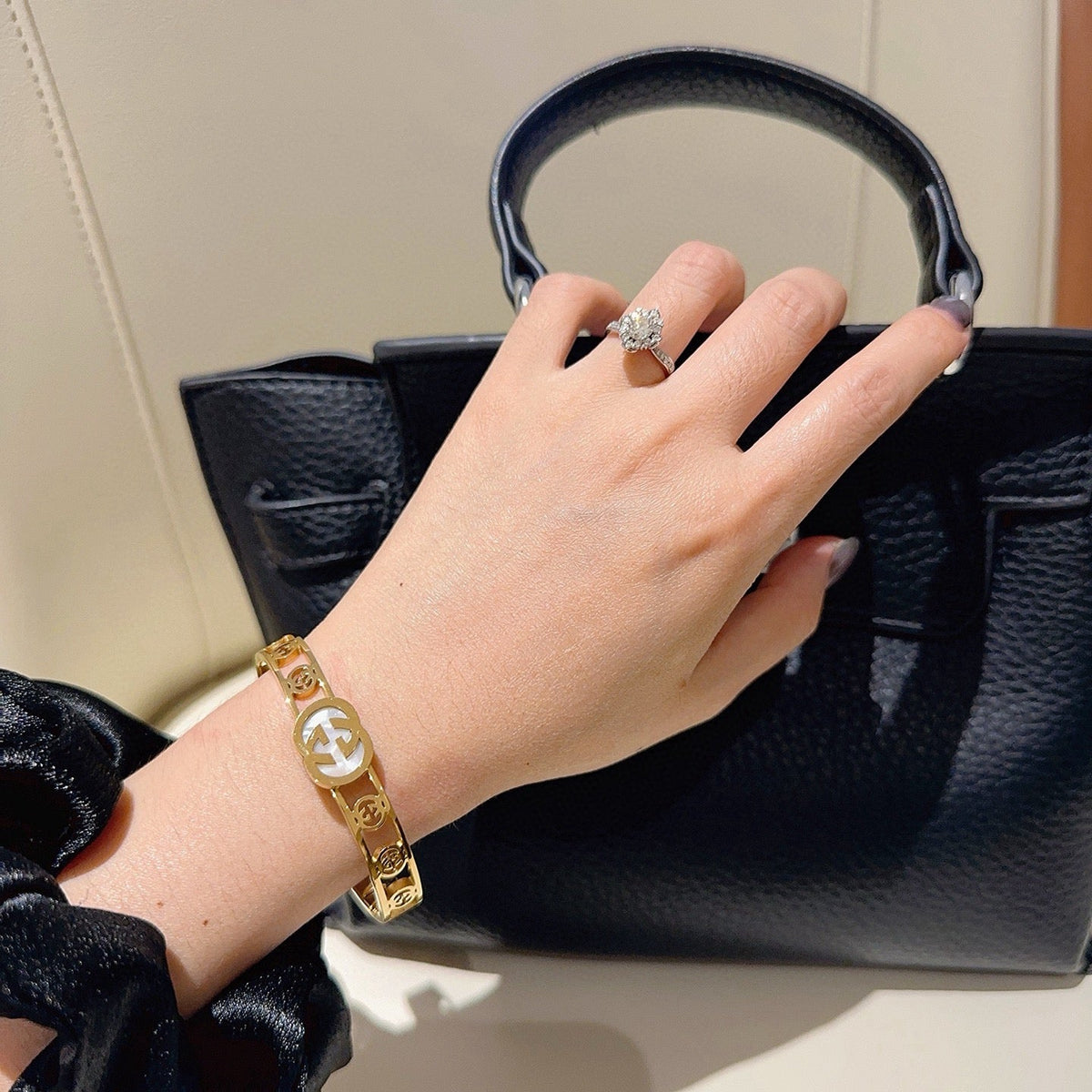 Martin Graham bangle in polished metal-tone – styled product view