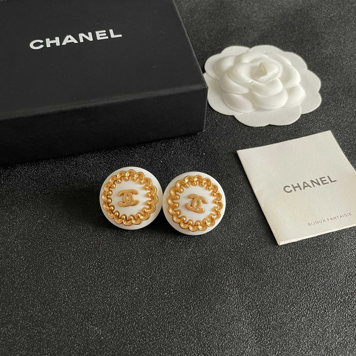 Martin Graham stud earrings in polished metal-tone – styled product view