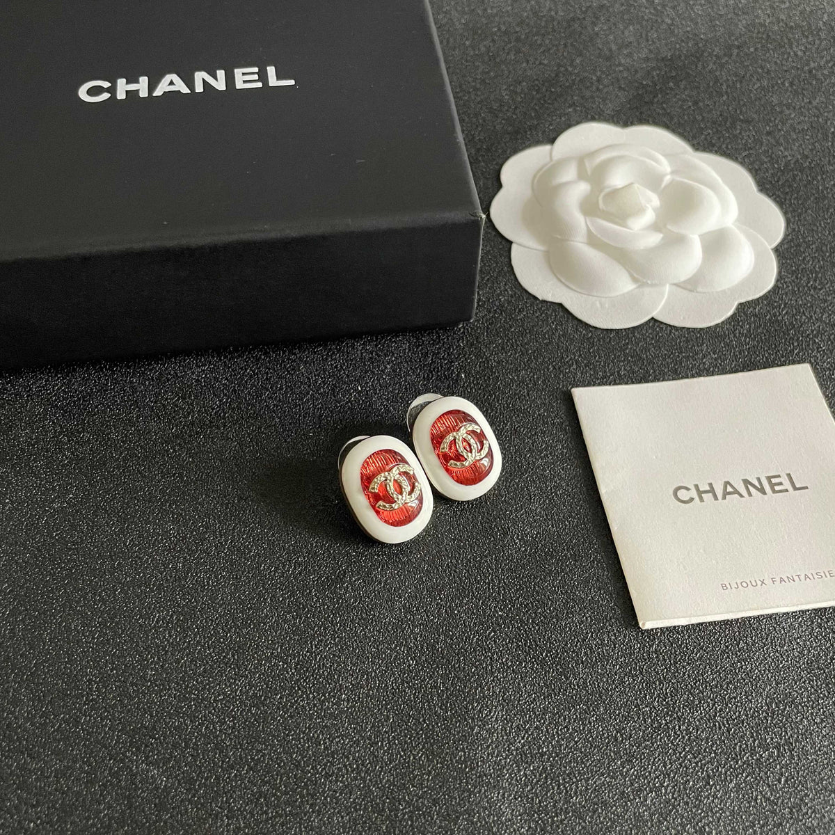 Martin Graham stud earrings in polished metal-tone – styled product view