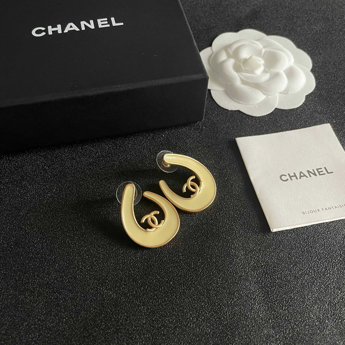 Martin Graham stud earrings in polished metal-tone – styled product view