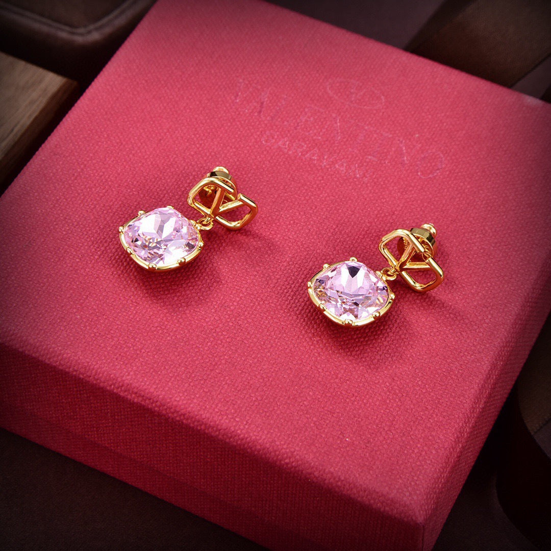 Martin Graham stud earrings in polished metal-tone