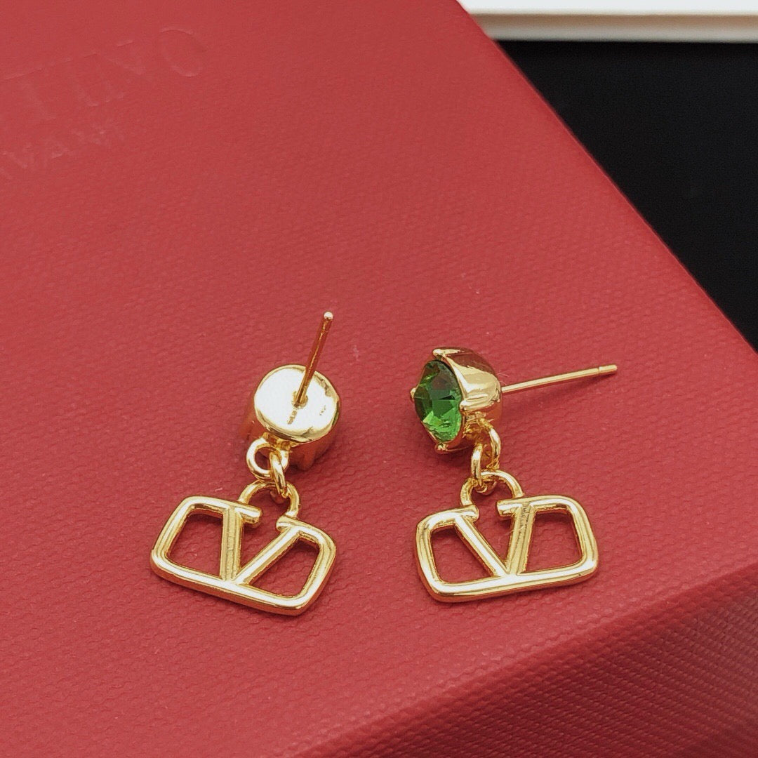 Martin Graham stud earrings in polished metal-tone