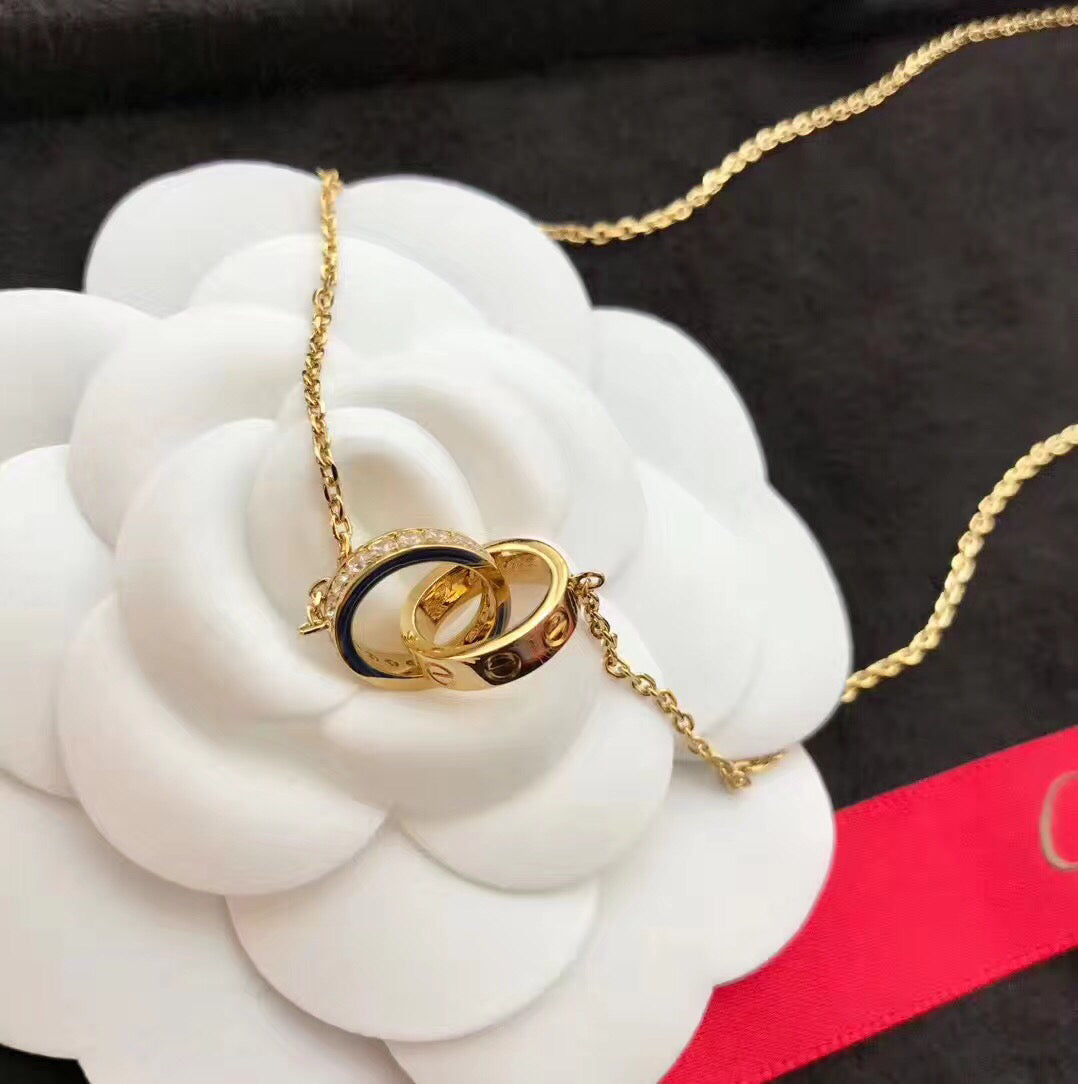 Martin Graham pendant necklace in polished metal-tone – close-up detail