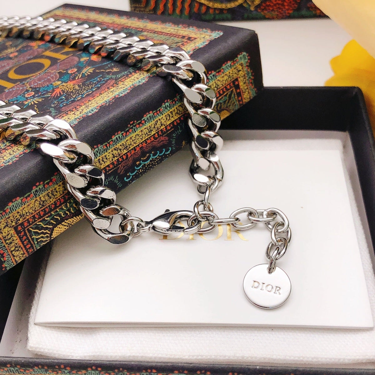 Martin Graham pendant necklace in polished metal-tone – close-up detail