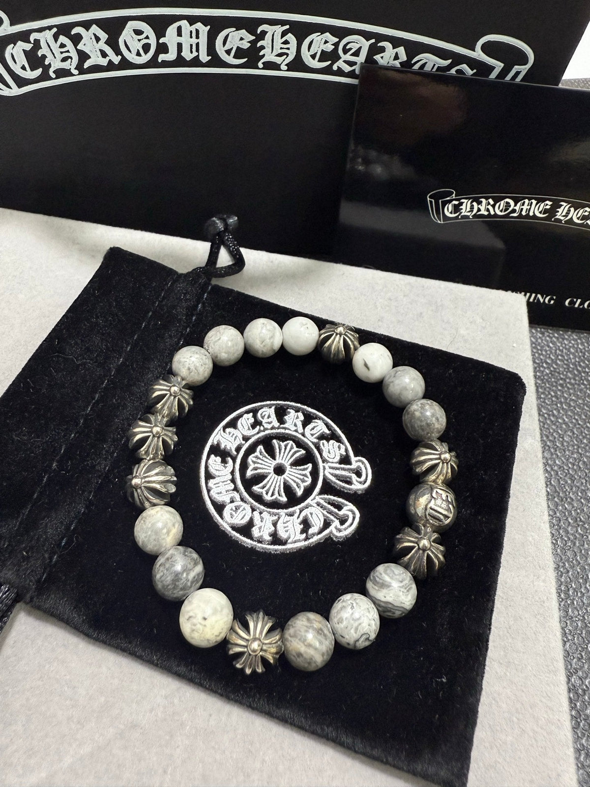 Martin Graham jewelry accessory in polished metal-tone – styled product view