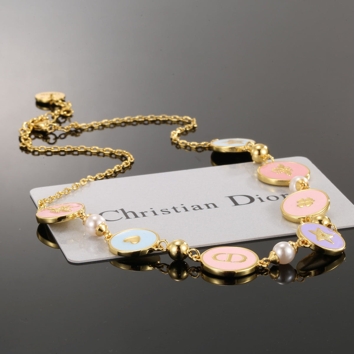 Martin Graham pendant necklace in polished metal-tone – close-up detail