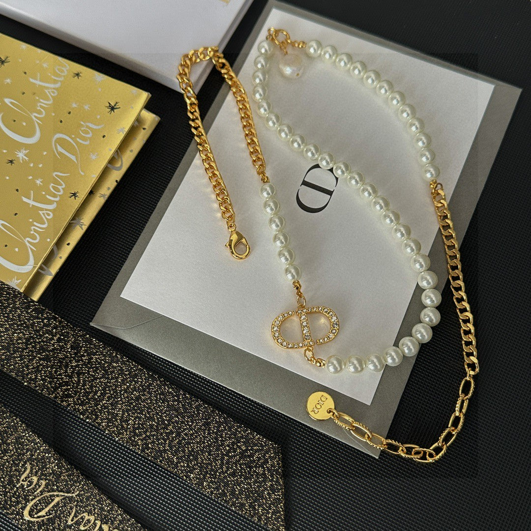 Martin Graham pendant necklace in polished metal-tone – close-up detail