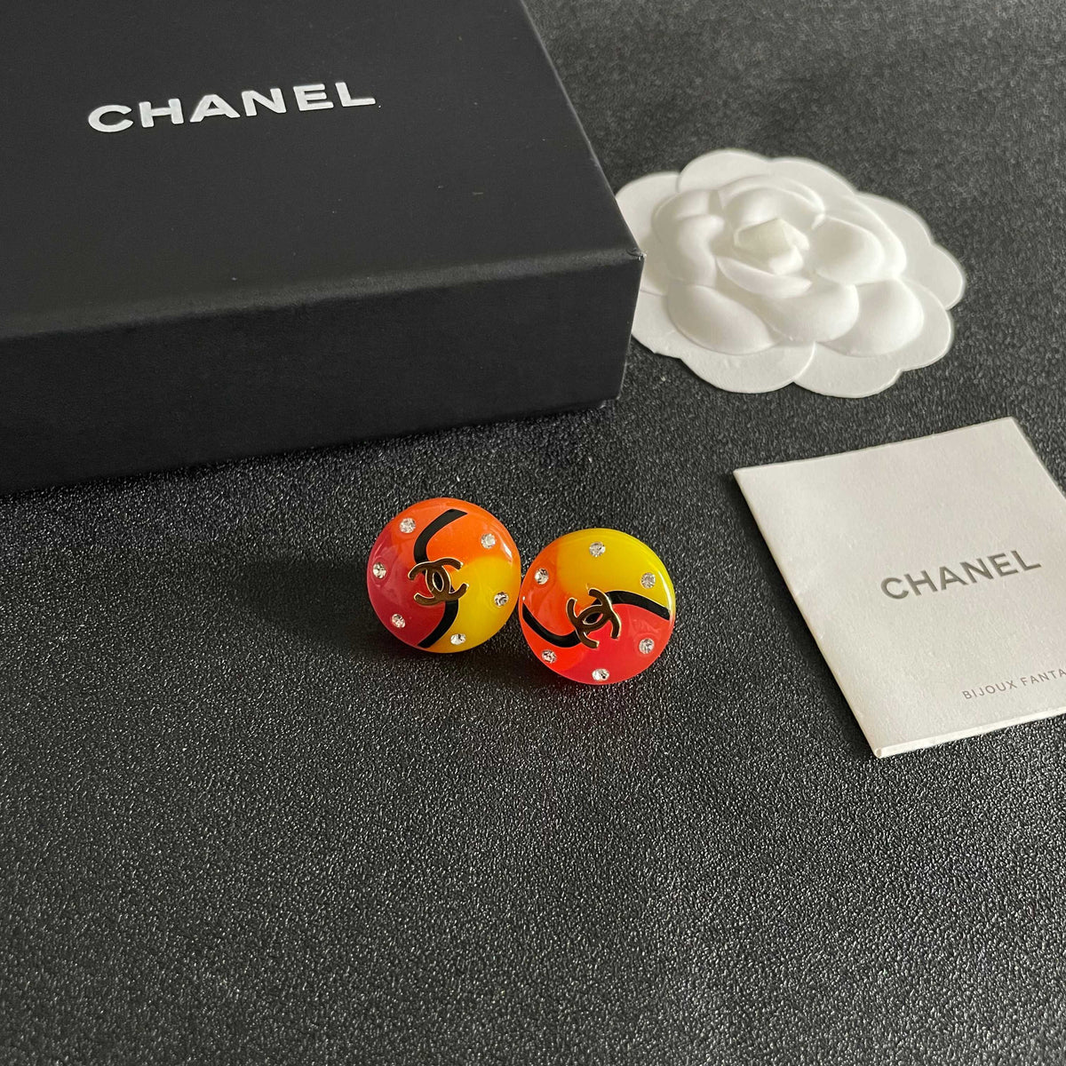 Martin Graham stud earrings in polished metal-tone – styled product view
