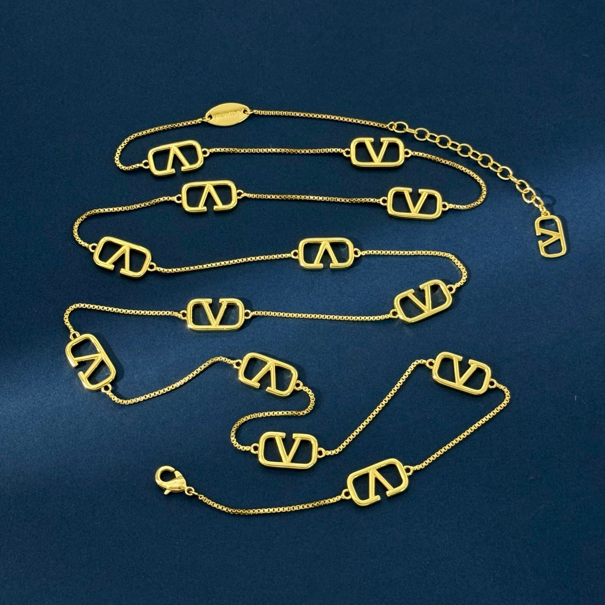 Martin Graham pendant necklace in polished metal-tone
