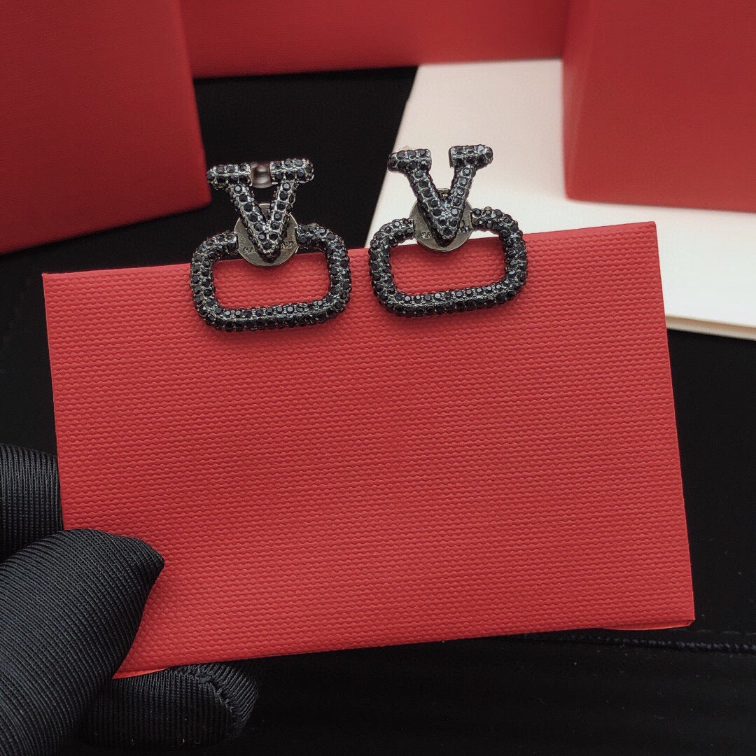 Martin Graham stud earrings in polished metal-tone – main product view