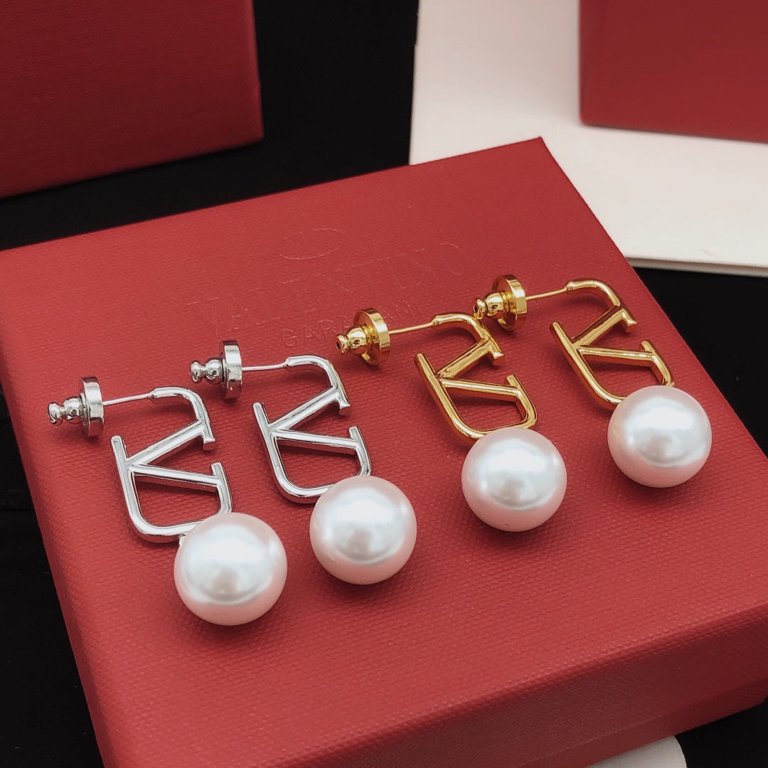 Martin Graham stud earrings in polished metal-tone – main product view