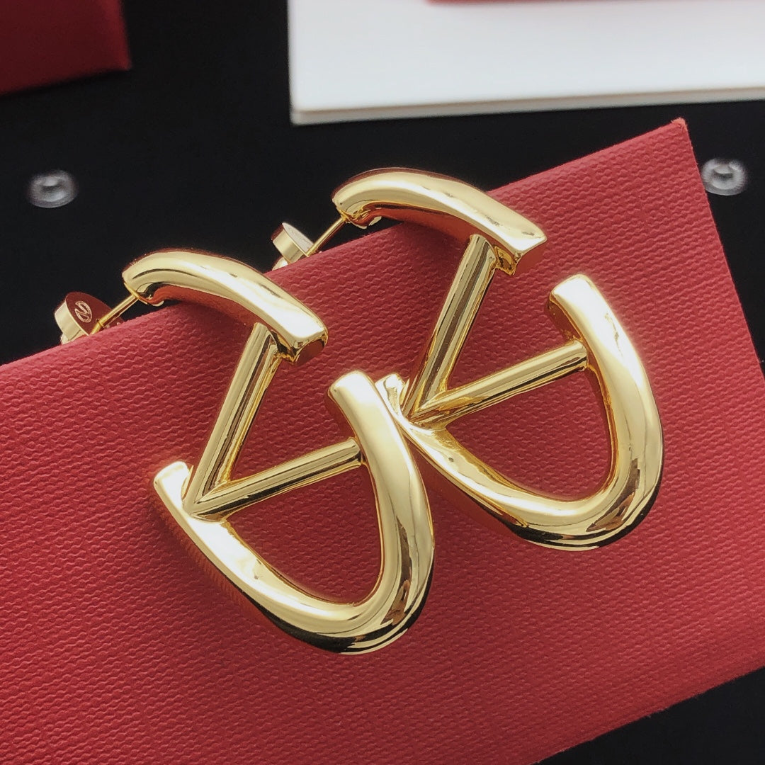 Martin Graham drop earrings in polished metal-tone – main product view