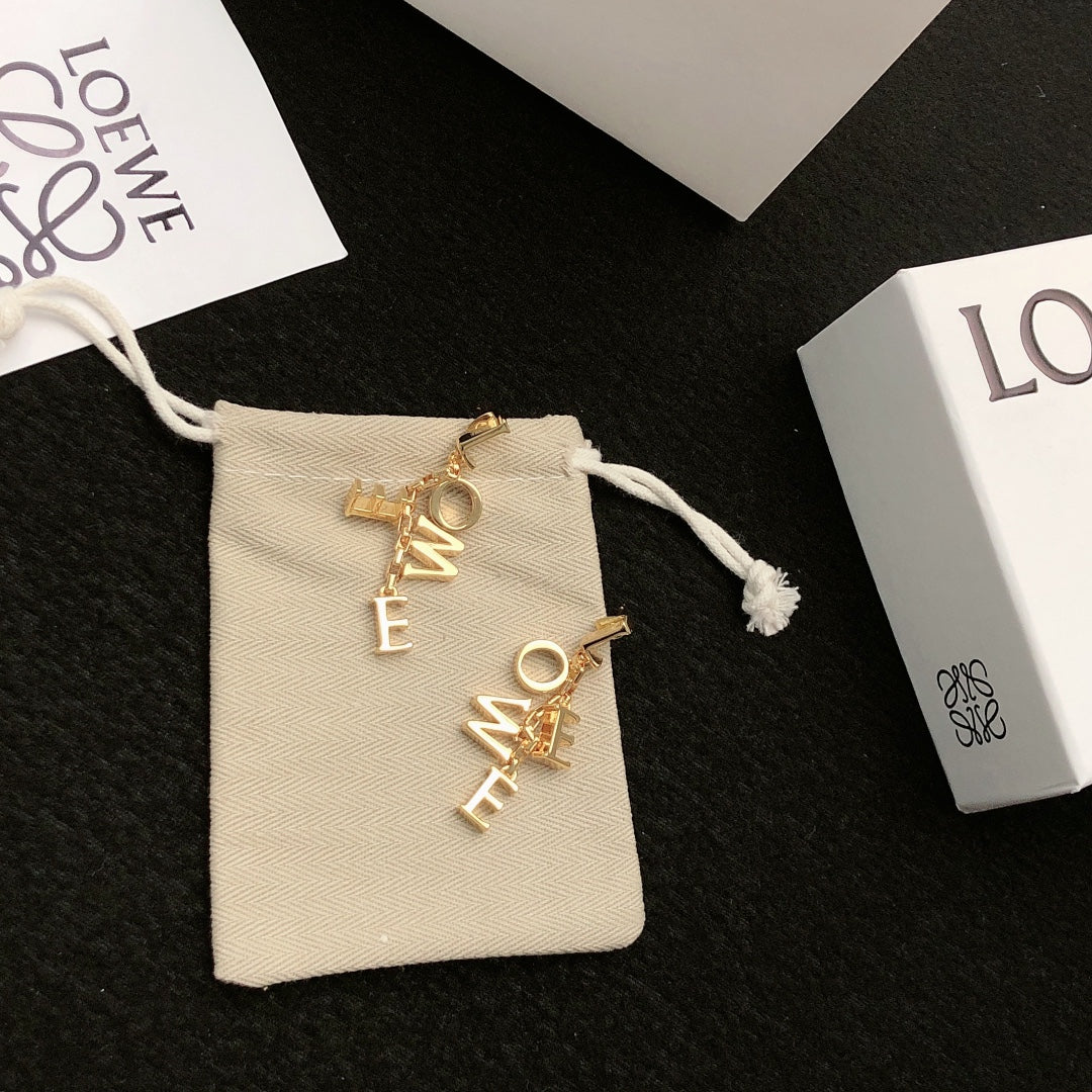 Martin Graham stud earrings in polished metal-tone – main product view