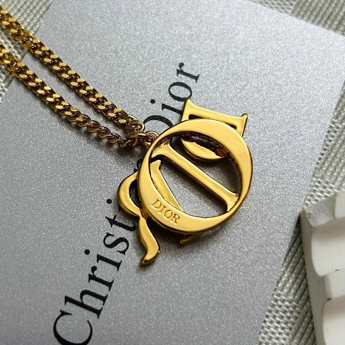 Martin Graham pendant necklace in polished metal-tone – main product view