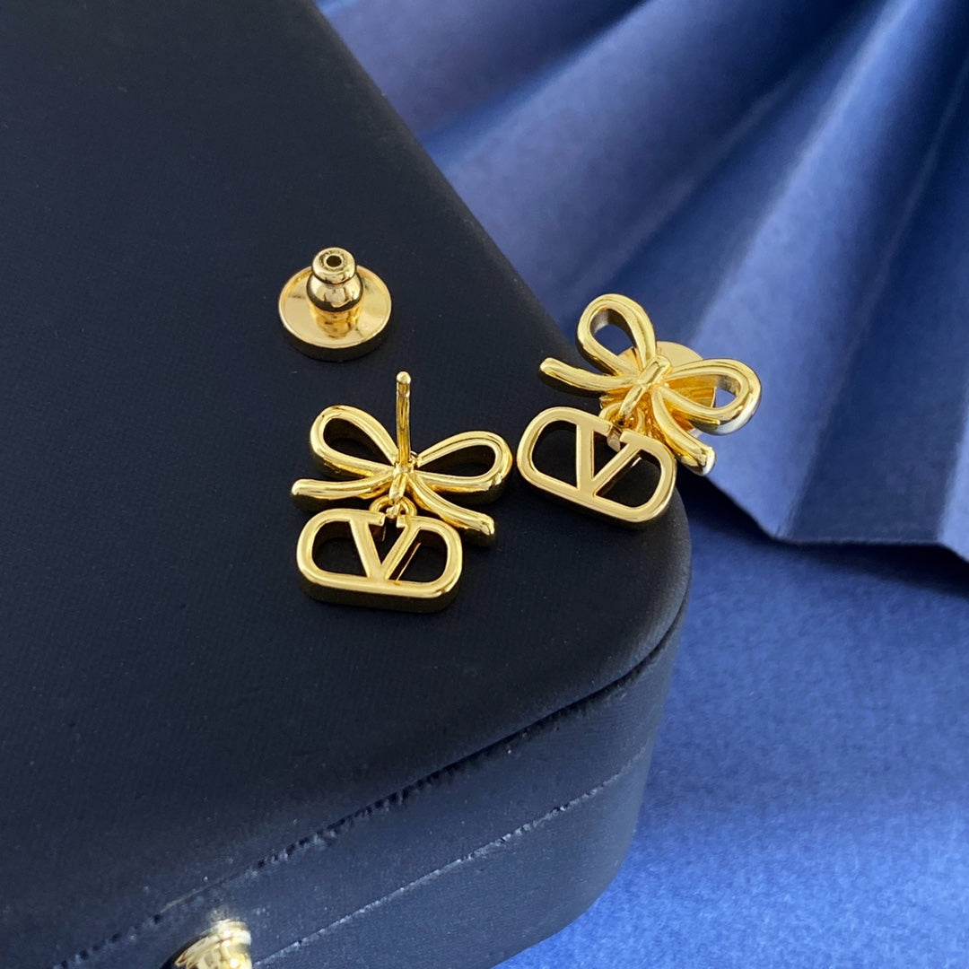 Martin Graham stud earrings in polished metal-tone – main product view