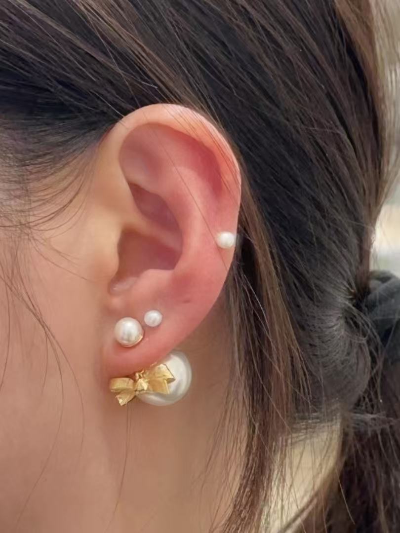 Martin Graham earrings in polished metal-tone – main product view