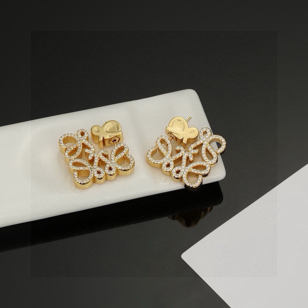 Martin Graham stud earrings in polished metal-tone – main product view