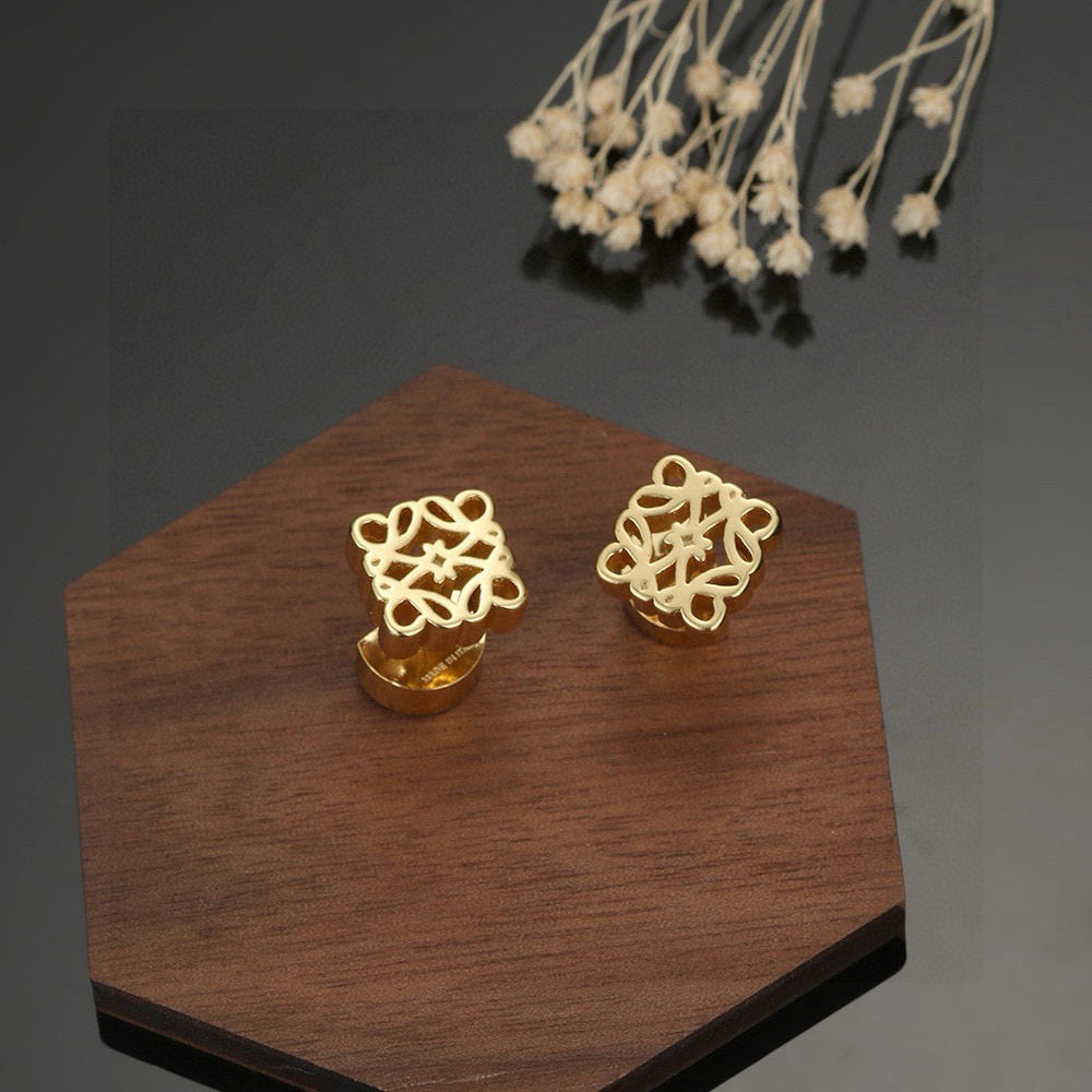 Martin Graham stud earrings in polished metal-tone – main product view