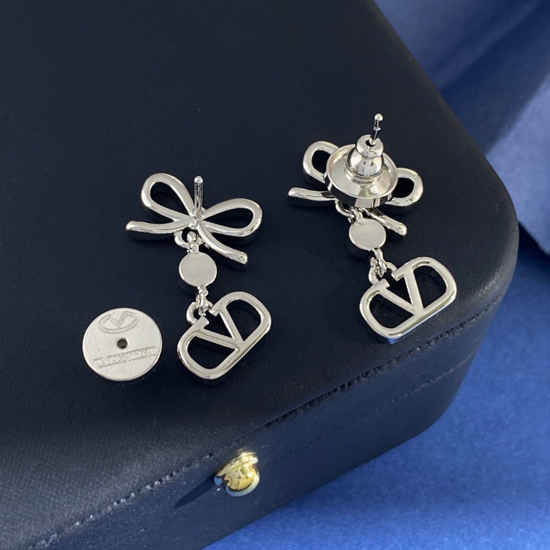 Martin Graham stud earrings in polished metal-tone – main product view